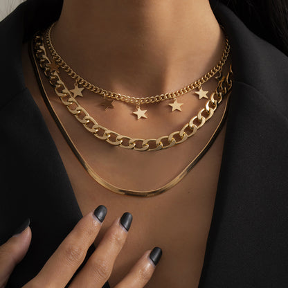 Collier Superposé Étoiles et Chaîne Serpent – Femme Moderne