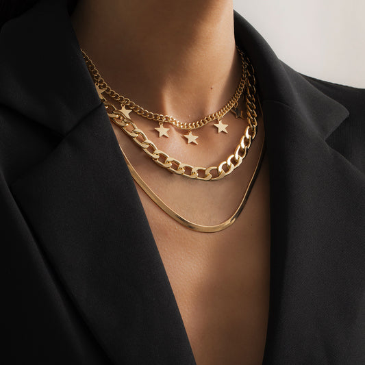 Collier Superposé Étoiles et Chaîne Serpent – Femme Moderne