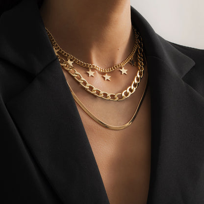 Collier Superposé Étoiles et Chaîne Serpent – Femme Moderne