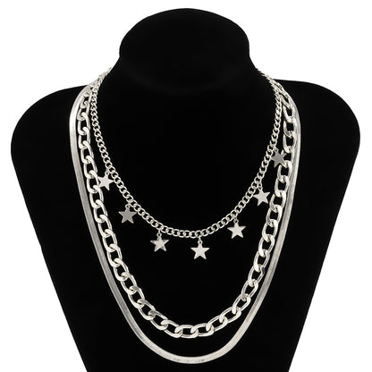 Collier Superposé Étoiles et Chaîne Serpent – Femme Moderne